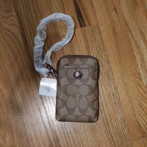 Coach cream phone case